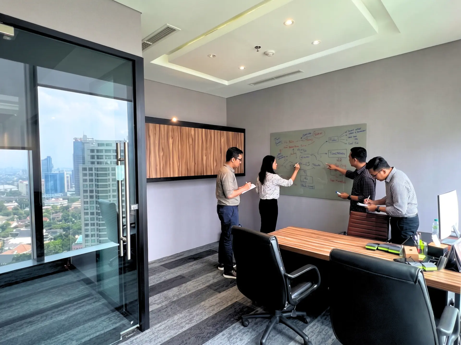 Gold Room private office with whiteboard and city view